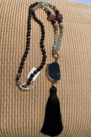 Gemstone necklace with black onex stone and silk tassel